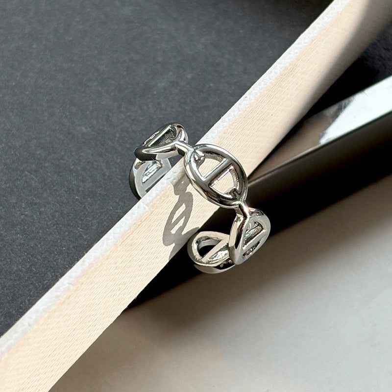 Gold and silver colored pig nose design open ring with full rhinestones for the index finger.