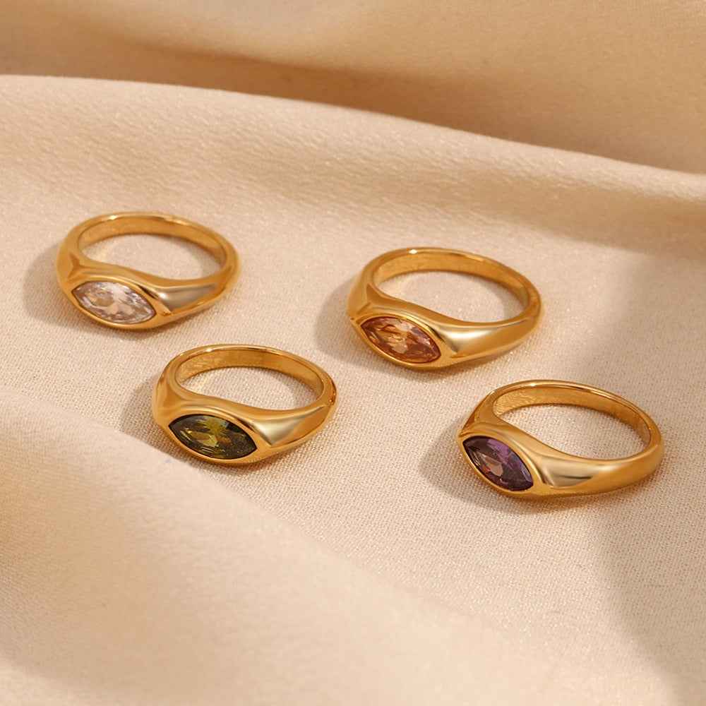 18K gold ring with marquise-cut zircon and seal design