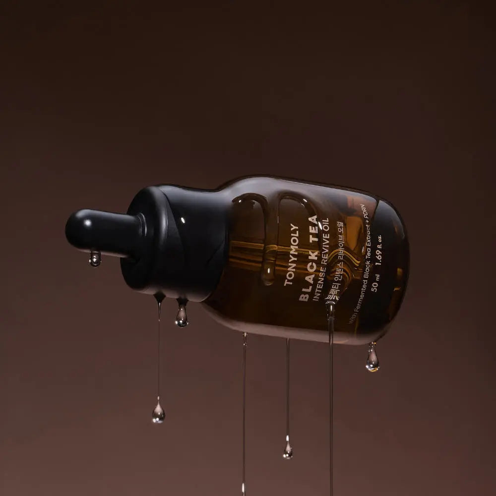TONYMOLY Black Tea Intense Revive Oil 50ml - Atelievuè