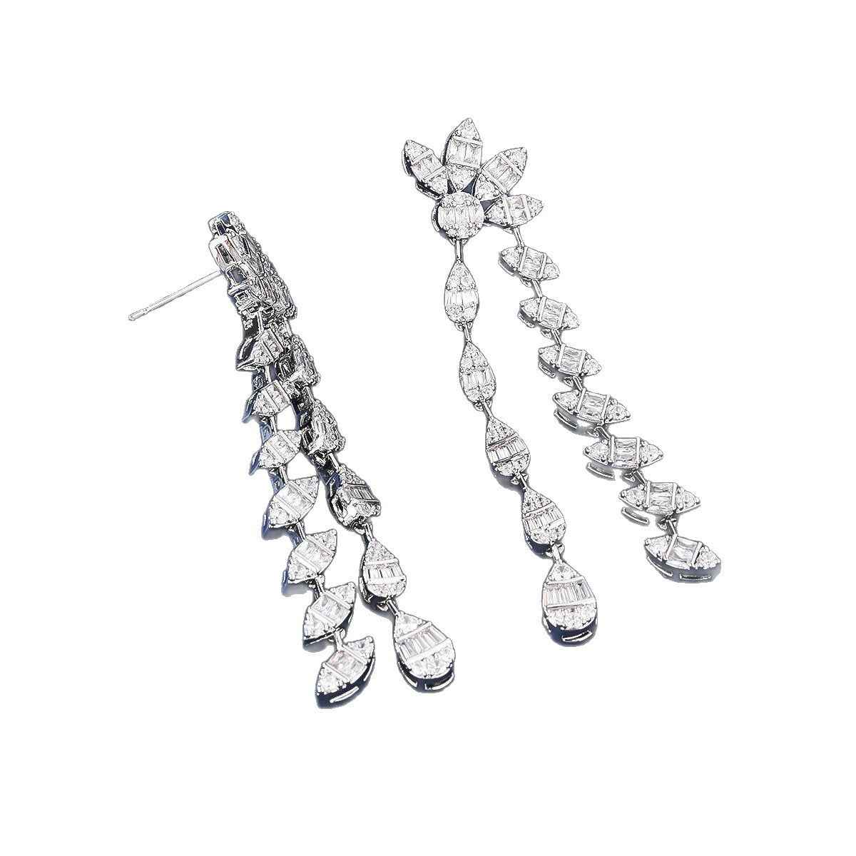 Floral design, fully encrusted with diamonds, double chain leaf earrings.