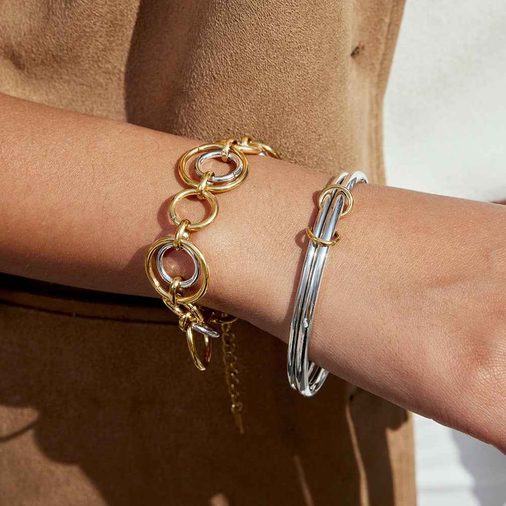 18K gold and S925 silver multi-strand bracelet with contrasting colors.